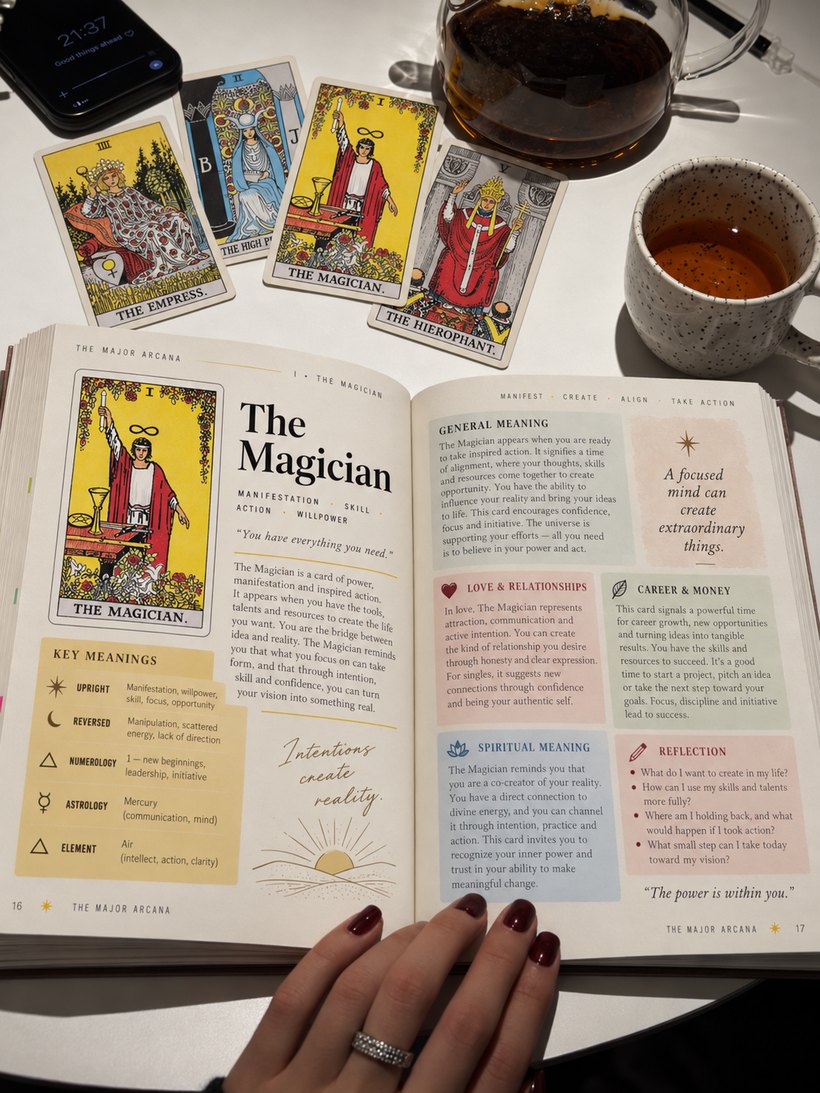 Customer photo: cards laid out beside the open Kit and a cup of tea